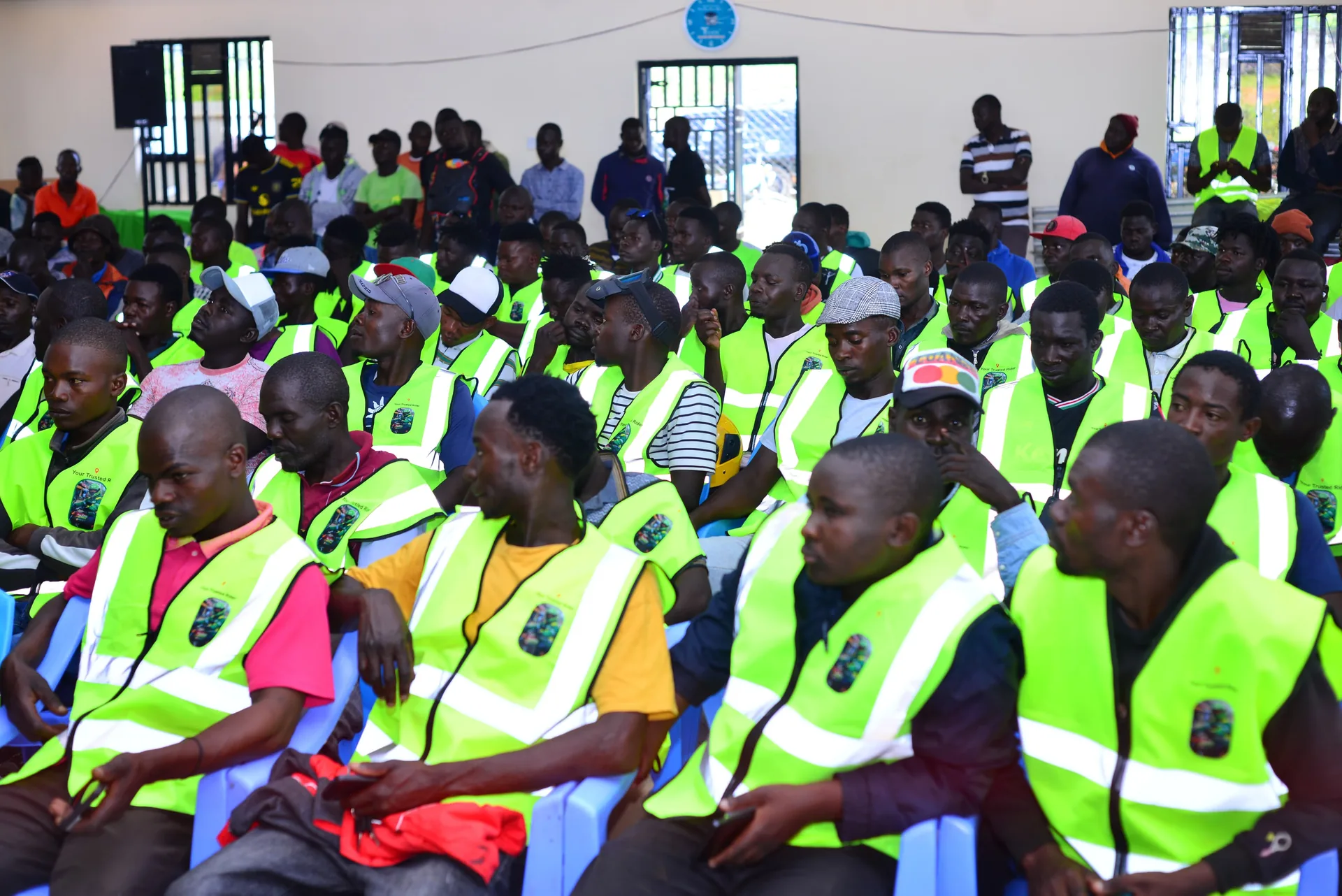 Masaa Chap Chap riders in branded hi-vis vests